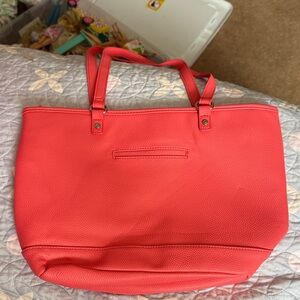 Brand new without tags Thirty-one purse coral color jewel. Never used.